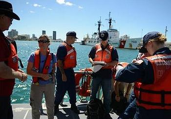 U.S. Coast Guard members prepare to sample Honolulu Harbor in wake of molasses spill (Photo courtesy U.S. Coast Guard)