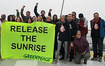 Greenpeacers aboard another of the group's vessels, the Rainbow Warrior, ask Russia to release the Arctic Sunrise, November 2013 (Photo Greenpeace Germany)