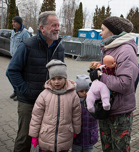 Beasley with refugees